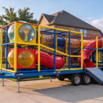 The Signature Mobile Playground trailer at sunset